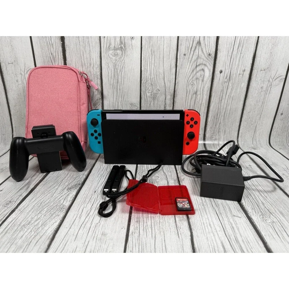 Nintendo Switch OLED  Blue Red Bundle Mint Condition Used Twice Adult Owned Case
